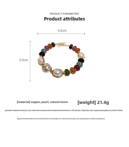 Detailed view of handmade baroque pearl cuff bracelet with colorful natural stones