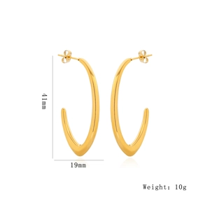 Detail view of large gold U-shaped earrings with 41mm height and 10g weight dimensions