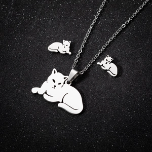 Minimalist silver stainless steel jewelry set featuring cat pendant necklace and stud earrings