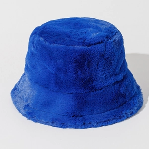 Detailed view of plush royal blue faux fur bucket hat with thick warm texture for winter