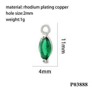 Macro shot of 11x4mm rhodium plated copper marquise pendant with green cubic zirconia