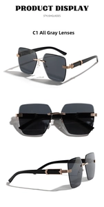 Detail view of C1 model rimless square sunglasses with dark grey resin lenses and gold metal temples