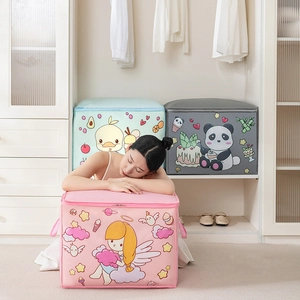 Detail of cartoon printed large storage bags with side handles and zipper closures