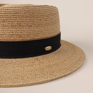 Classic raffia panama hat for men featuring black ribbon and gold metal logo accent