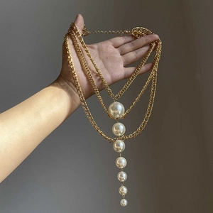 French vintage multilayer pearl necklace with gold alloy chains and cascading white pearls
