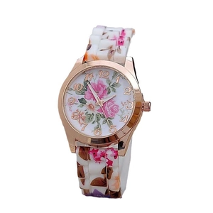 Classic Geneva floral print watch with rose gold case and colorful blossom pattern