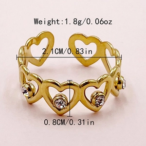 Detailed view of golden heart chain ring with clear stones including size and weight specs