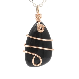 Minimalist wire-wrapped black teardrop crystal pendant necklace with rose gold wire detailing