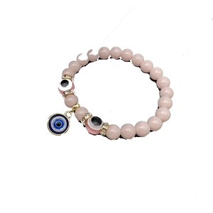Pink beaded Evil Eye bracelet with glowing crystal stones and sparkling spacers