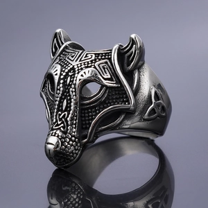 Detailed close-up of a Viking wolf head ring in vintage silver finish with Celtic patterns