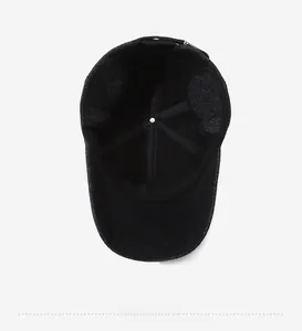 Detail view of the cap's inner six-panel stitching and adjustable metal buckle closure