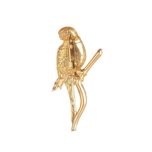 Golden parrot brooch perched on a branch made of elegant stainless steel for women