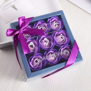 Soap flower gift box with 9 purple gradient roses and silk ribbon on white wood