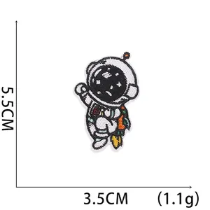 Close-up of astronaut embroidery patch with dimensions 5.5cm x 3.5cm and 1.1g weight