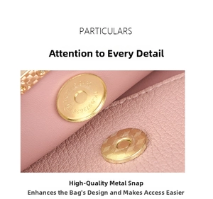 Detailed macro view of gold magnetic clasp on pink pebble grain leather phone bag