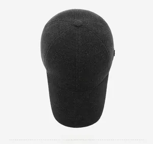 Top down view of thick dark grey wool blend baseball cap showing panel stitching detail