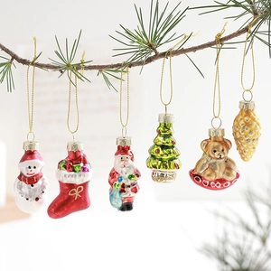 Set of 6 colorful glass Christmas ornaments featuring snowman and tree on pine branches