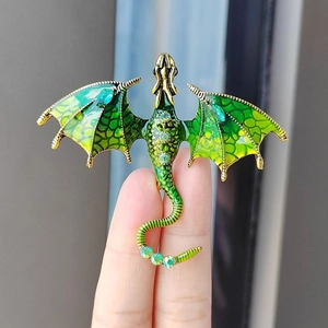 Exquisite gold dragon brooch with green enamel and sparkling rhinestones for clothing