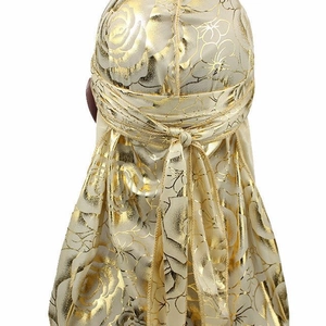 Golden silky durag with jacquard rose pattern and long tail straps for hair styling