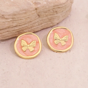 Boucles d'oreilles papillon vintage françaises avec émail rose sur base en métal doré