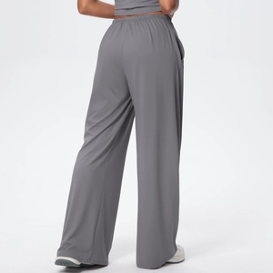 Rear view of grey wide leg joggers showing soft fabric drape and elastic waistband detail