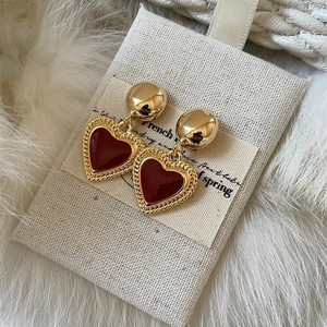 Vintage French 18K gold heart earrings with deep red enamel and twisted rope edge