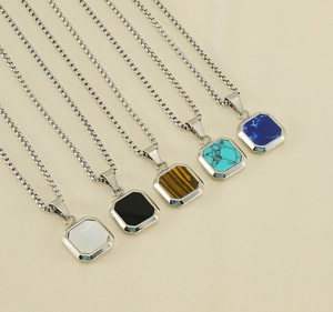 Detail of octagonal pendants with natural stones on gold stainless steel chains