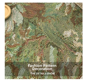 Detailed macro view of vintage jacquard woven linen fabric with intricate floral patterns