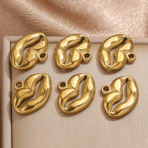 Detailed view of six gold hollow lip pendants for DIY punk necklace jewelry making