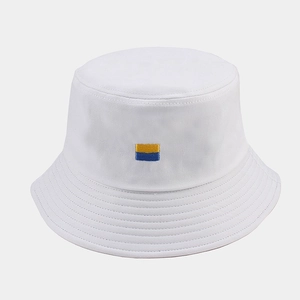 White cotton bucket hat featuring Ukraine flag yellow and blue embroidery on the front