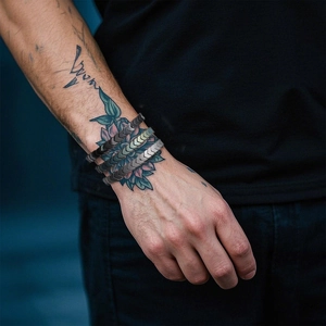 Men's magnetic hematite cross bracelets set with V-shaped arrow geometric design