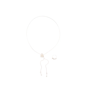 Minimalist zircon firework jewelry set with silver necklace and matching ring on white background