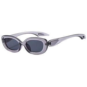 Modern oval grey translucent sunglasses with streamlined hollow temples on white background