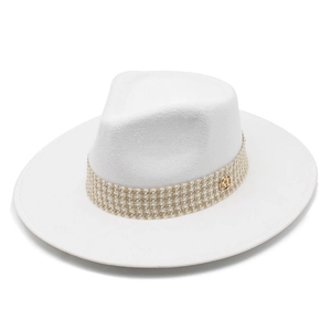White wool fedora with wide brim featuring a gold M emblem and textured woven band