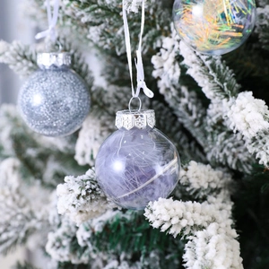 Shatterproof Christmas tree ornaments with purple feathers, silver glitter, and colorful tinsel