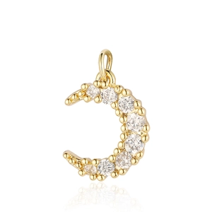 Macro detail of gold plated moon pendant with sparkling cubic zirconia inlay and small beads