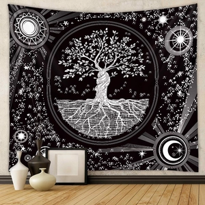 Detail of bohemian Tree of Life tapestry featuring sun and moon patterns in a room setting