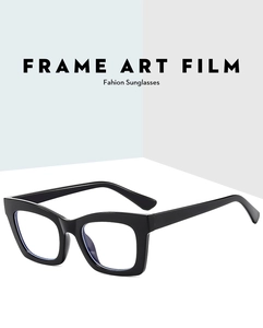 Macro detail of large square black frame glasses with anti-blue light coating