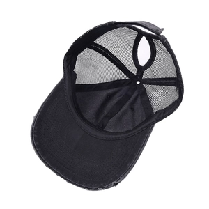Distressed black ponytail baseball cap with breathable mesh and adjustable strap back