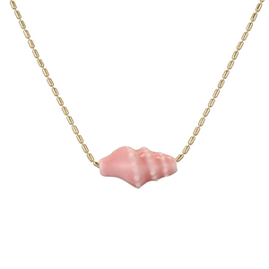 Detailed view of pink conch shell pendant on a gold beaded chain necklace