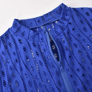 Detailed view of the blue hollow mesh fabric and resin zipper on the sexy bodysuit