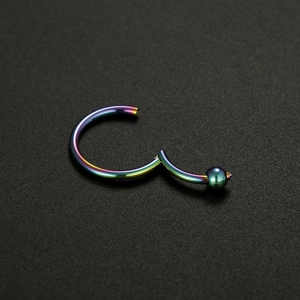 Rainbow stainless steel C-ring piercing with bead for nose and ear on black background