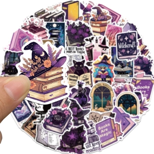 Close-up of waterproof purple gothic bookish witch stickers showing creative magic designs