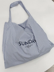 Blue and white striped canvas tote bag with Sunday Summer Night slogan print