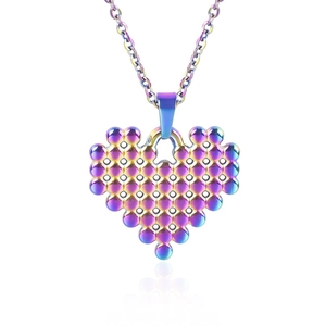 Detailed view of rainbow-colored heart necklace with mesh sphere pattern on white background