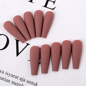 Detailed view of long ballerina matte press-on nails in mocha brown reddish finish