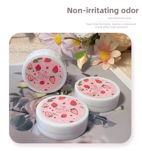 Three boxes of strawberry scented nail polish remover pads with 32 pieces per round tin