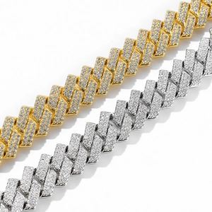 Detail of 14mm S925 sterling silver Cuban link chains in gold and silver finishes