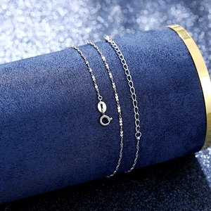 Macro shot of 925 sterling silver water wave chain necklace with adjustable spring clasp