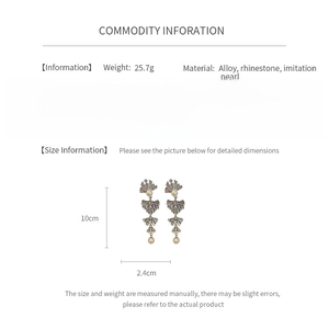Detailed size specifications for pearl bow tassel earrings showing 10cm x 2.4cm dimensions
